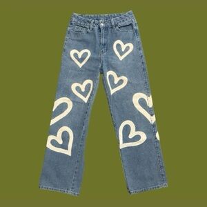 Light wash jeans with heart decals size women’s M